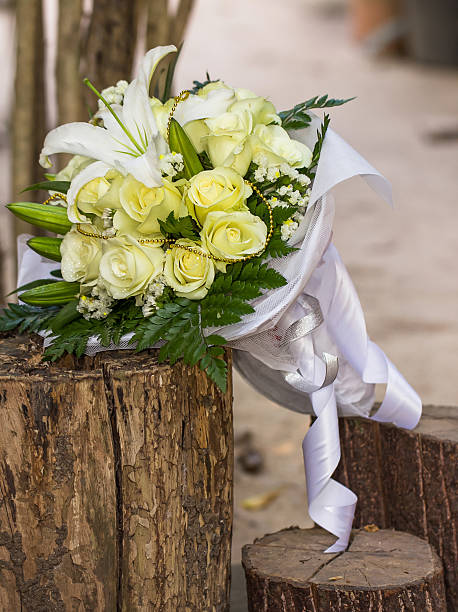 istock wedding bouquet of White roses & white Lily 502254862