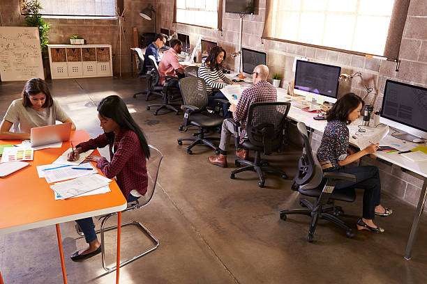 istock Elevated View Of People Working In Modern Design Office 502263174
