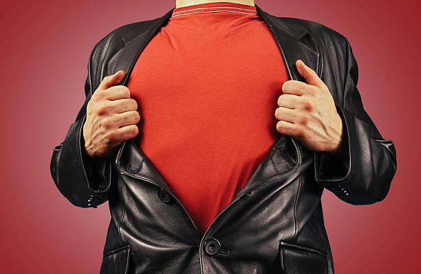 istock Man opens jacket showing red t-shirt 502272511
