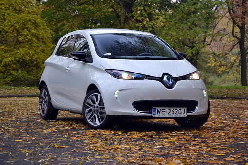 Warsaw, Poland - 16th, October 2013 - test drive of a Renault Zoe - new electric car. This car was revelated at the 2012 Geneva Motor Show. New Zoe is powered by electric engine with 88 HP (220 Nm) and his maximum speed is 135 km/h. The battery capacity is 22 kWh, and their weight is 290 kg. On a suburban route, Zoe can generally achieve range around 100-150 km depends of climate and driving style.