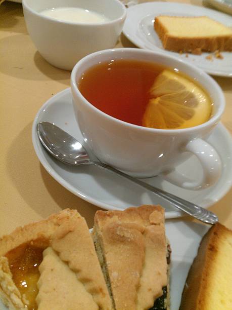 istock Breakfast Table Arrangement With Cake And Tea 502274727