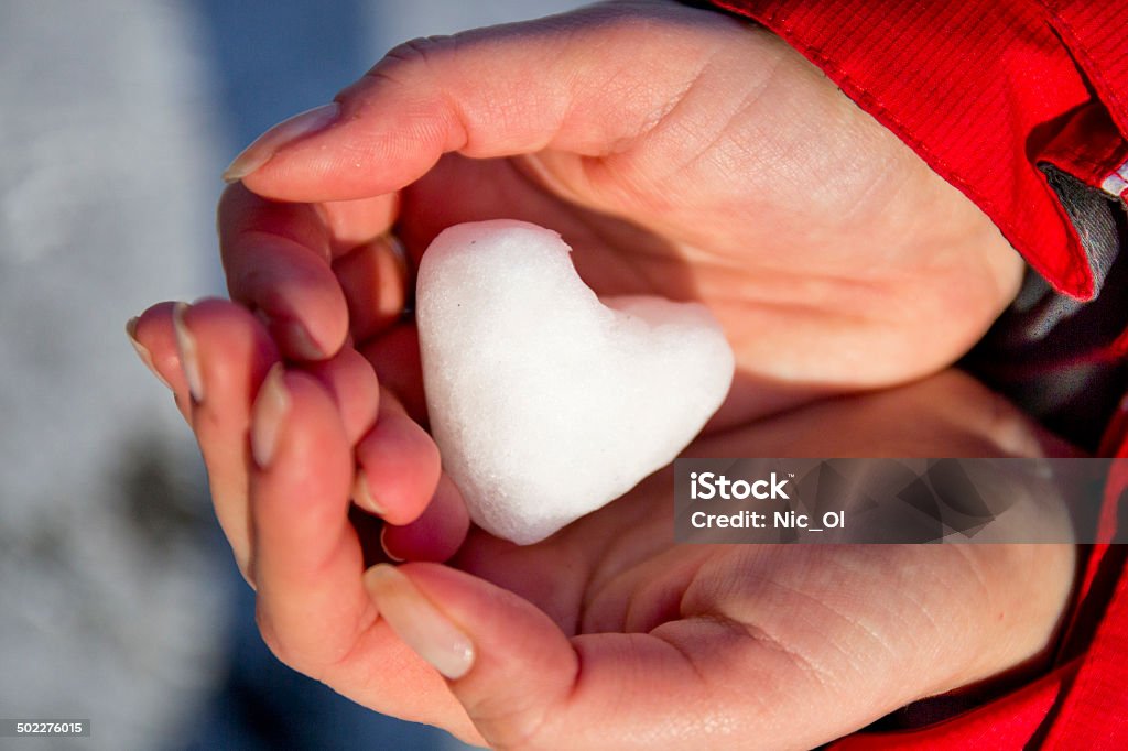 ice in the form of heart hands ice in the form of heart hands closeup Close-up Stock Photo