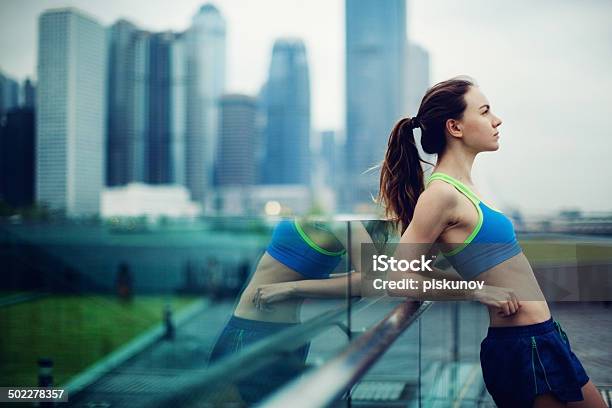 Young Woman Exercising Outdoors Stock Photo - Download Image Now - Active Lifestyle, Activity, Adult