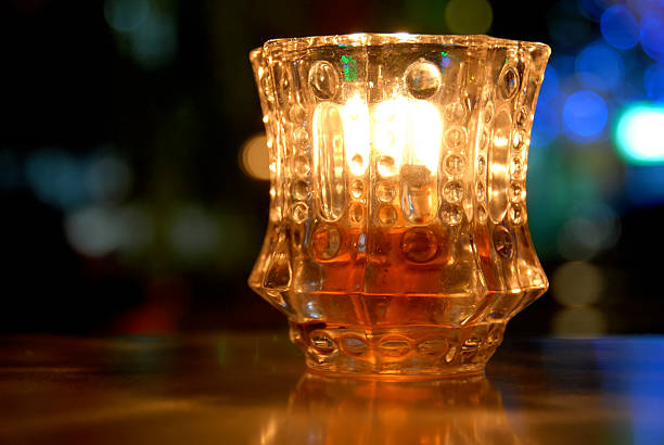 Candle in a glass stock photo