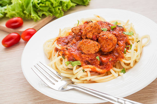 istock Spaghetti with meatballs in tomato sauce 502279595