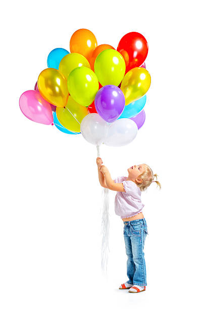 istock Cute little girl with balloons 502281614