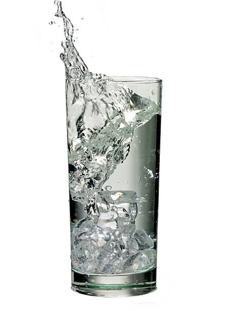istock ice cube dropped into the water with splash 502282566
