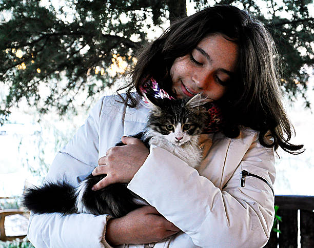 istock girl and kitten 502288912
