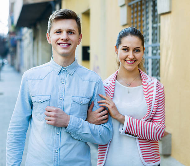 istock Cheerful  girl and handsome man having a walk together 502288930