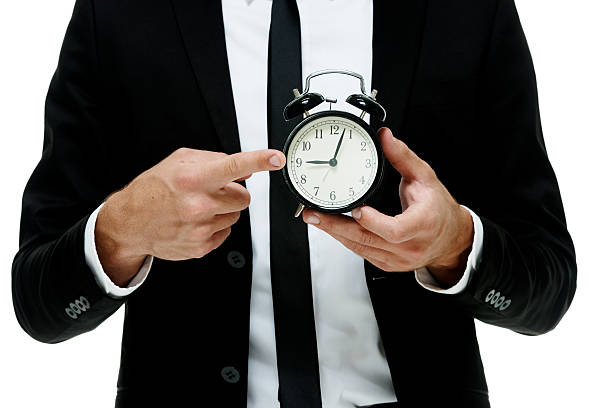 istock Businessman pointing at time 502289096