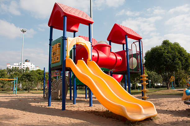 istock children playground in park , 502292866