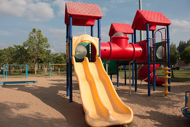 istock children playground in park , 502293044