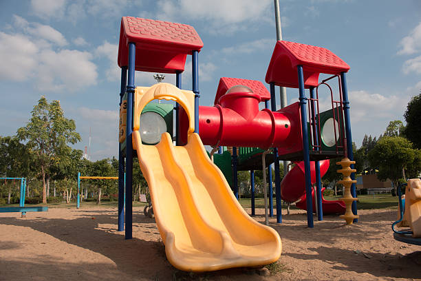 istock children playground in park , 502293138
