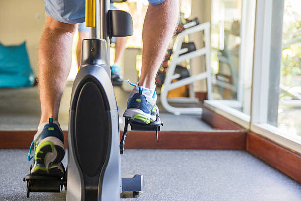 istock Adult man warming up on indoor bicycle 502294548