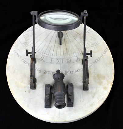A sundial from the late 18th century that can fire a noon day gun using reflected light.