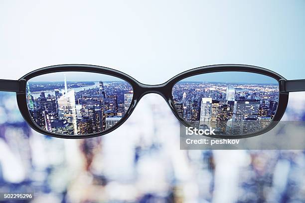 Clear Vision Concept With Eyeglasses And Night Megapolis City Ba Stock Photo - Download Image Now
