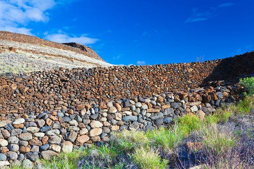 A wall made of rocks.