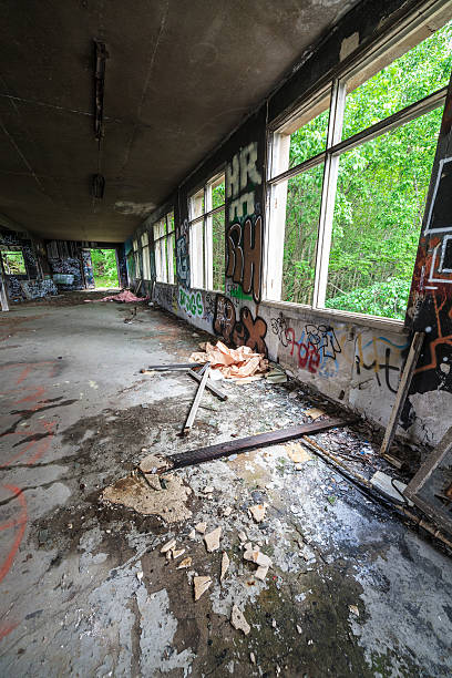 istock Abandoned factory hall and windows 502296439