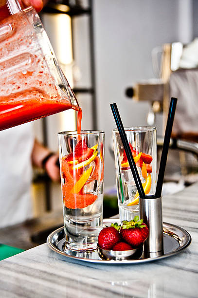 istock Pouring strawberry smoothie 502299127
