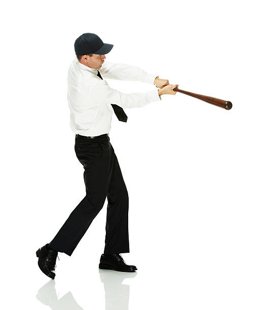 istock Businessman in action with baseball bat 502299143