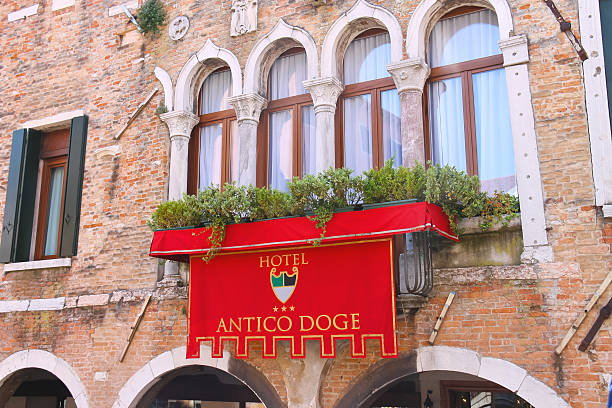 Facade of the hotel "Antico Doge" in Venice, Italy Venice, Italy - May 6, 2014:  Facade of the hotel "Antico Doge" in Venice, Italy palazzo antico stock pictures, royalty-free photos & images