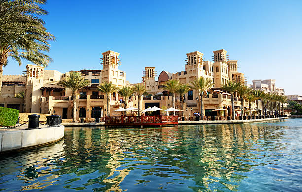 Dubai, UAE - September 9, 2013: View of the Souk Madinat Jumeirah. Madinat Jumeirah encompasses two hotels and clusters of 29 traditional Arabic houses.