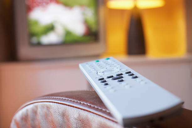istock Remote Control And TV In Living Room 502301225