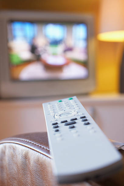 istock Remote Control And TV In Living Room 502301227