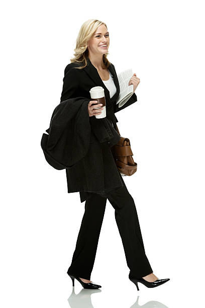 istock Smiling businesswoman walking & looking away 502301507