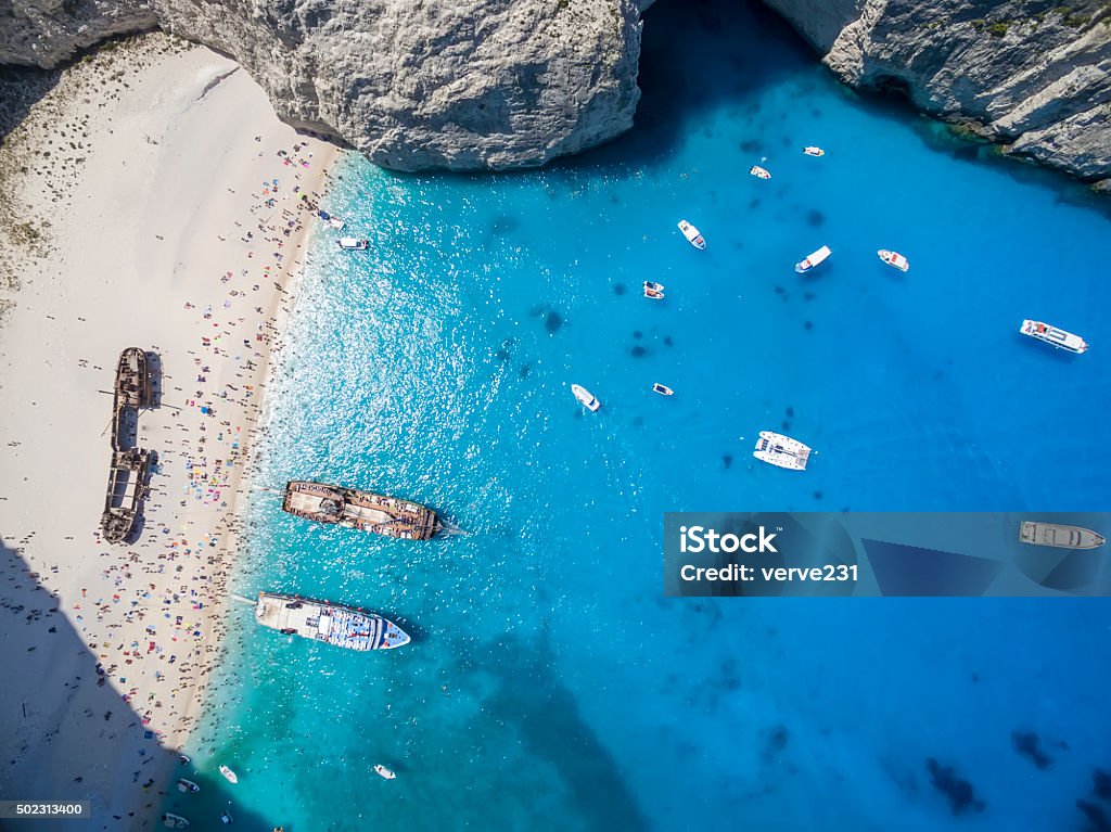 Aerial view of Navagio (Shipwreck) Beach in Zakynthos, Navagio B Aerial view of Navagio (Shipwreck) Beach in Zakynthos, Navagio Beach is a popular attraction among tourists visiting the island of ZakynthosAerial view of Navagio (Shipwreck) Beach in Zakynthos, Navagio Beach is a popular attraction among tourists visiting the island of Zakynthos Aerial View Stock Photo