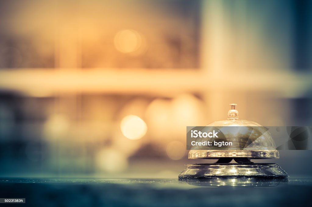 Restaurant bell Restaurant bell vintage with bokehRestaurant bell with bokehRestaurant bell vintage with bokeh Concierge Stock Photo