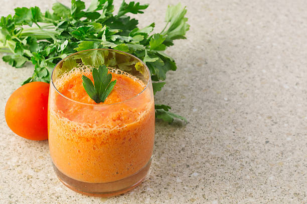 istock Tomato and carrot gaspacho in glass on the table 502314158