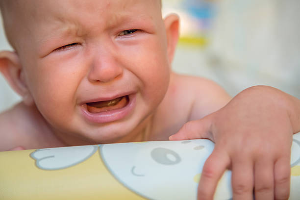 Crying baby stock photo