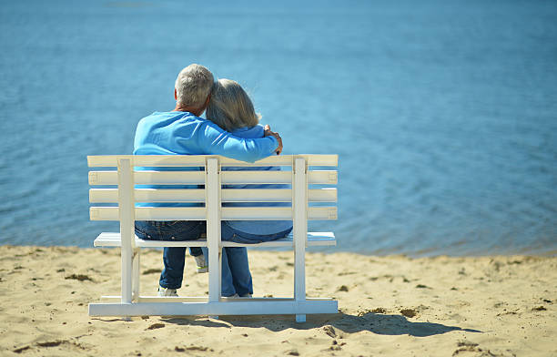 istock Senior couple resting at park 502316044