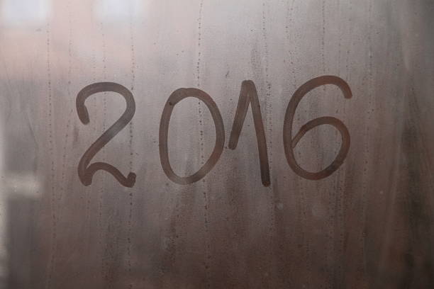 istock New Year 2016 written on the glass 502318412