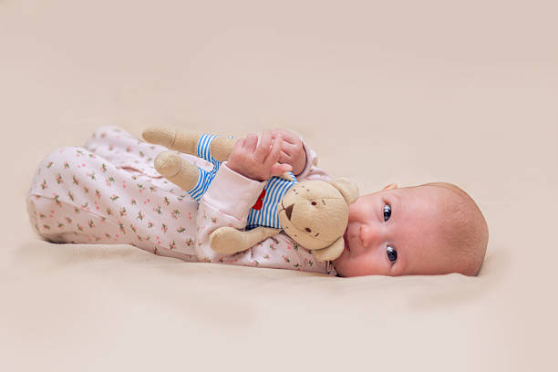 istock Infant child with a toy 502318616