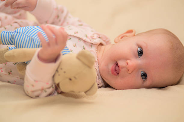 istock Infant child with a toy 502318696