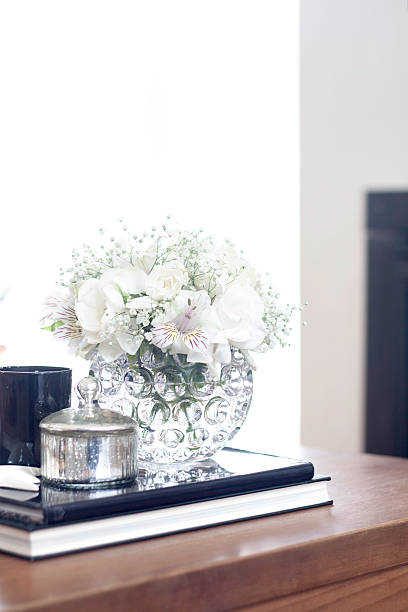 istock Coffee table living room decoration with white flowers 502318818