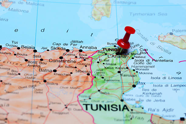 tunis pinned on a map of africa - tunisia stok fotoğraflar ve resimler