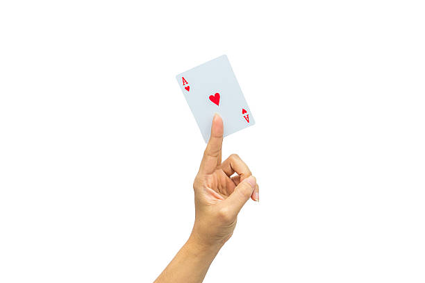 istock Playing cards in hand isolated on white background 502321106