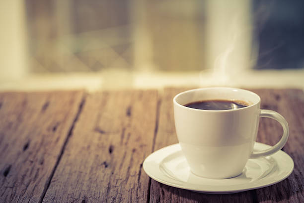 Coffee hot cup Coffee cup on a day window background tea cup photos stock pictures, royalty-free photos & images