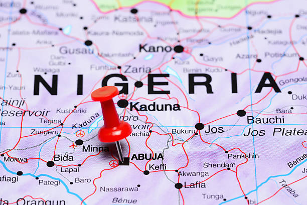 Abuja pinned on a map of Africa Photo of pinned Abuja on a map of Africa. May be used as illustration for traveling theme. abuja stock pictures, royalty-free photos & images