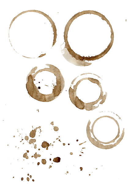 istock Brown coffee cup stains and splatters isolated on white 502323638