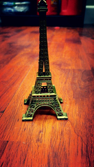 A picture of a little souvenir of the Eiffel Tower. 