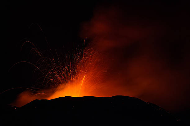 istock Volcano eruption. Mount Etna erupting from the crater Voragine. 502327332