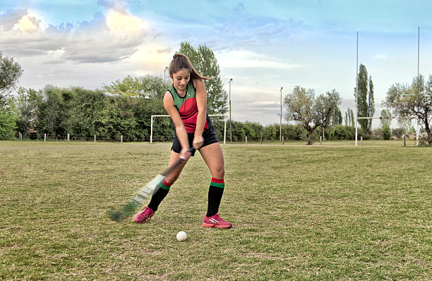 Field hockey Woman playing field hockey. field hockey stock pictures, royalty-free photos & images