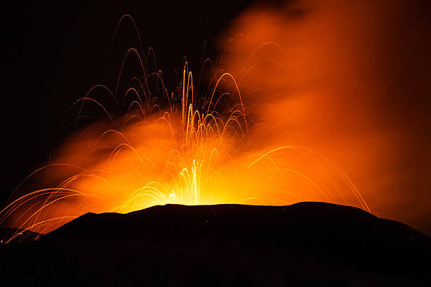 istock Volcano eruption. Mount Etna erupting from the crater Voragine. 502328484
