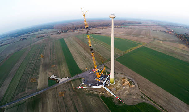 Wind turbine being under construcion surrounded by agricultural fields in Polish country side. Poland, Western Part. Lubuskie voivodship.