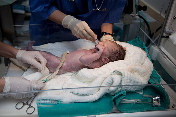 istock newborn first medical exam 502346417