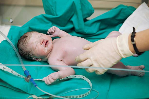 istock newborn first medical exam 502346423